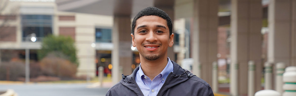 ChristianaCare Community Health Worker Kevin Moore smiles into the camera