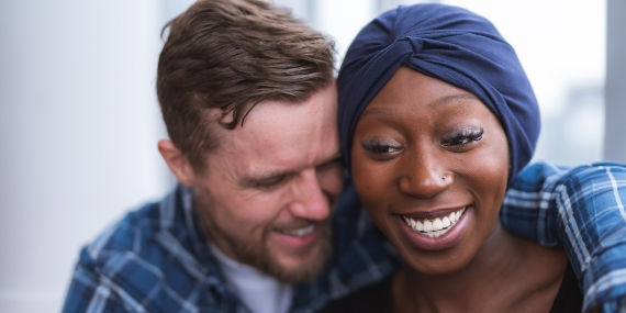 Male supporting female cancer patient