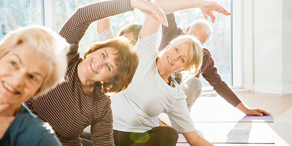 Seniors in a yoga class