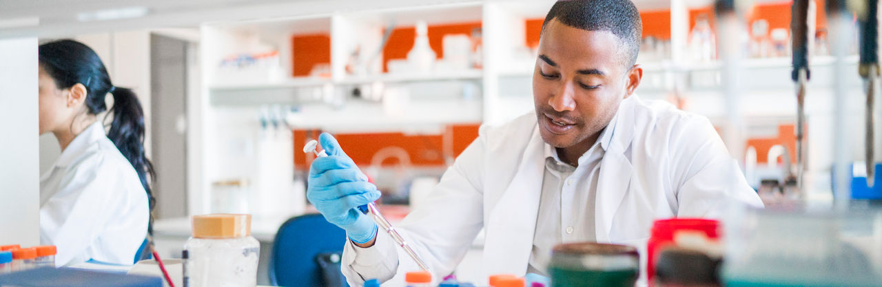Scientist analysing samples in a lab
