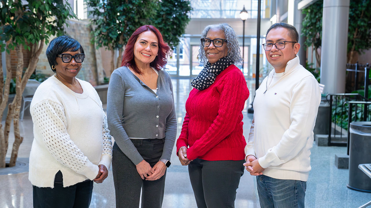 ChristianaCare Health Guides pose for a picture in the atrium at Wilmington Hospital