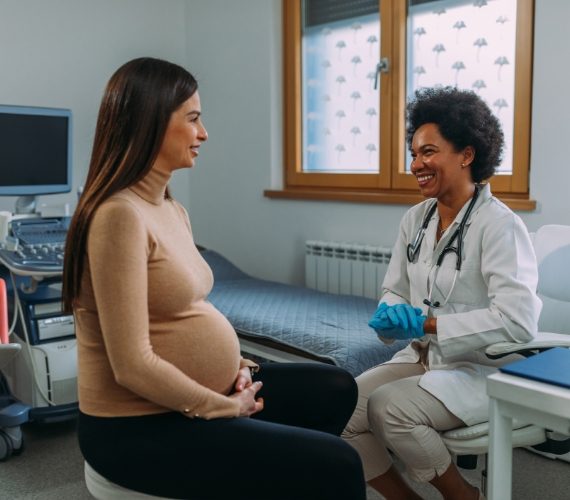 Pregnant woman during examination at doctor office