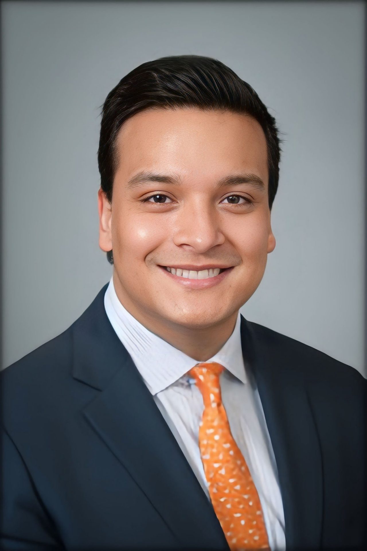 A headshot portrait of Andres Moreira