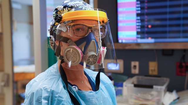 Woman in full PPE equipment