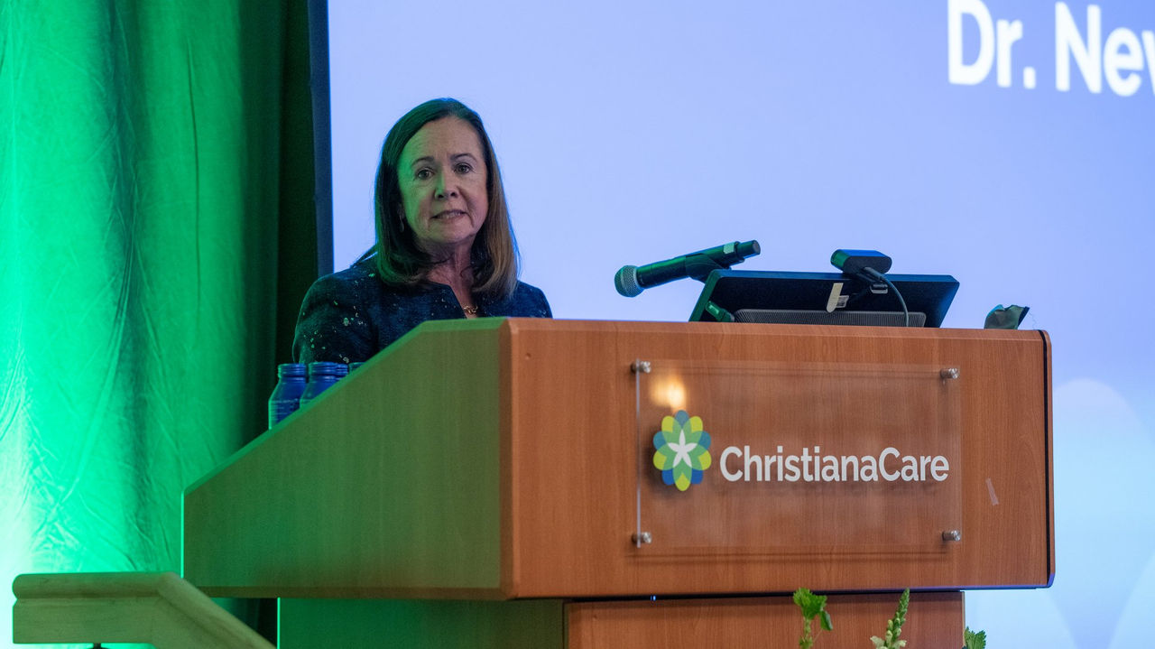 Dr. Nevin speaks at the ChristianaCare podium during the Way Awards ceremony.