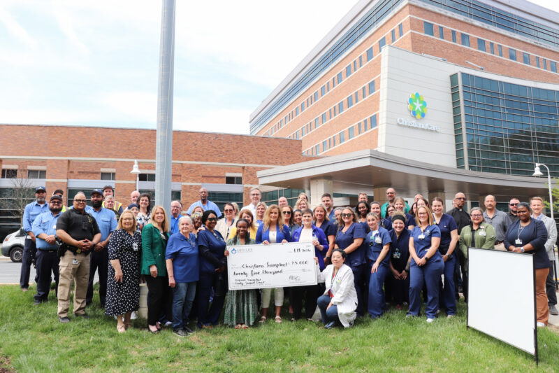 With the transplant team and Gift of Life team is Pat Laurin (front row, center), whose son Tony Rivera was an organ donor. Onyi Kenine stands beside her mother Edith Kenine, who is a nurse at ChristianaCare and calls her daughter’s transplant “a miracle.”
