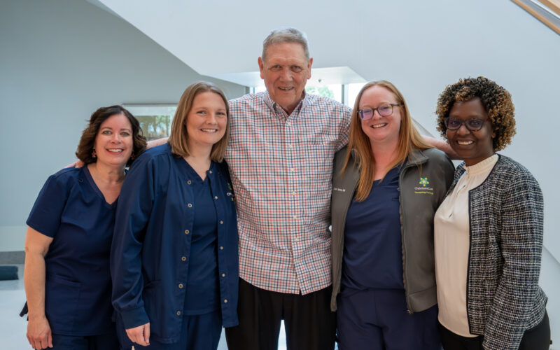 Portrait of Bill Osborne with Graham Cancer Center Research Team