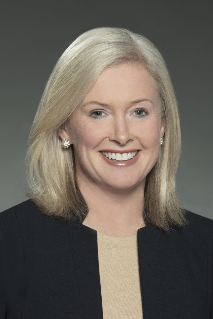 Smiling woman in a suit