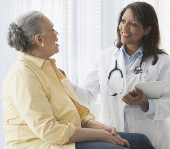 Patient with doctor at hospital
